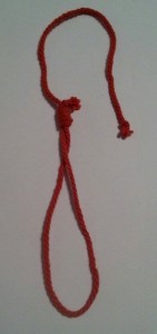 Token for the Red Knotted Noose. Photo by Baroness Eva von Danzig.