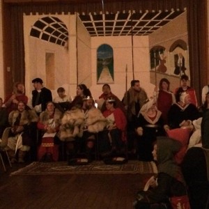 Some members of the populace "Cranach rolled" Midwinter. This picture shows their group shot, and the frescoe in the background. Photo by Lord Nicodemus, July 2014