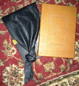 Two of the leather-bound books given to Count Niall inn Orkneyski and Countess Liadan ingen Fheradaig, photo by TH Lady Ceara Shionnach.