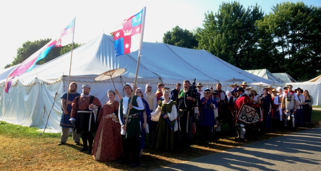 The Lochac procession assembling in front of the Lochac campsite for the march into Opening Court at Pennsic War 44. Photo by THB Ceara Shionnach, August 2015.