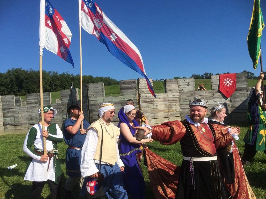 Their Majesties Steffan and Branwen at Opening Court at Pennsic War 44. Photo by THB Ceara Shionnach, August 2015.