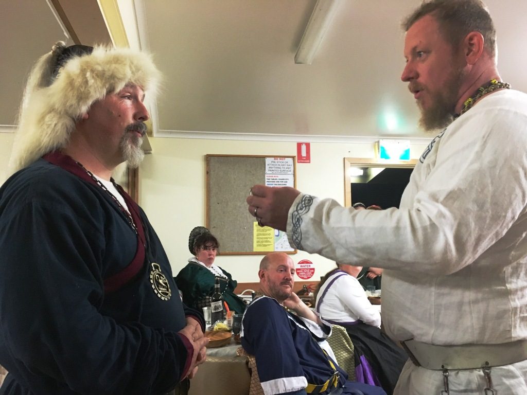 Crown Prince ThorolfR presented Orlok Hanbal with the Baronial ring of Stormhold, with the latter standing in as Vicar until Twelfth Night 2017. Photo by THB Ceara Shionnach, May 2016.